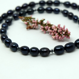 Upinių perlų vėrinys