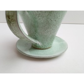 Rankų darbo žaliai pilko ruko spalvos keraminis puodelis bei lėkštutė