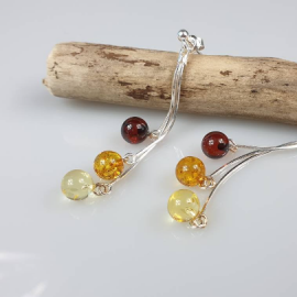 Auskarai  "Apvalučiai". Ilgi gintariniai auskarai. 