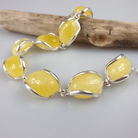 Balto gintaro sidabrinė apyrankė