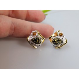 Dideli sidabriniai vinukai su gintaru ir aukso detalėmis Dideli sidabriniai vinukai su gintaru ir aukso detalėmis