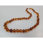 Maži apvalūs gintaro karoliai mamos dienos proga dovana mamai.