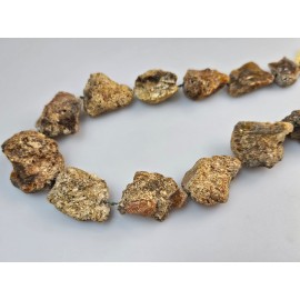 Gydomieji žalio gintaro karoliai skydliaukės gydymui. Neapdirbto gintaro karoliai