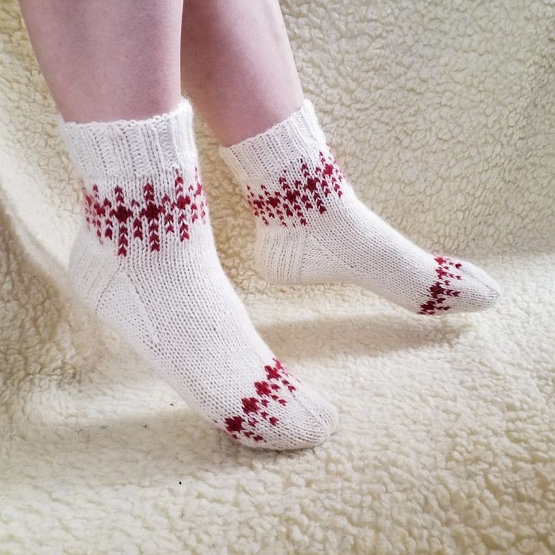 Baltos uogautojų kojinaitės Baltos uogautojų kojinaitės