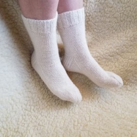 Baltos vilnonės kojinės minimalistams