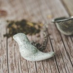 Arbatos sietelis su baltu paukšteliu Arbatos sietelis su baltu paukšteliu