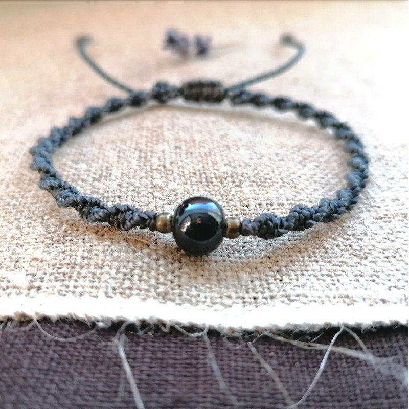 Apyrankė su keramikos karoliuku (pilka) Apyrankė su keramikos karoliuku (pilka)