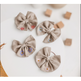 Lininis kaspinėlis su siuvinėjimais