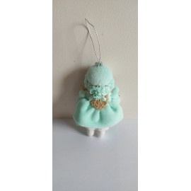 Mergaitė laikanti eglutę Mergaitė laikanti eglutę