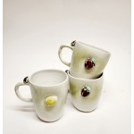 Puodelis su obuoliuku