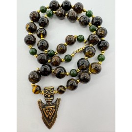 Vyriškas papuošalas iš gintaro su žalvarine ietimi