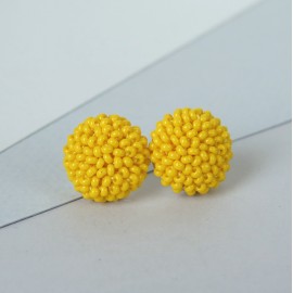 GERVUOGĖLĖS. Geltoni apvalūs auskarai 