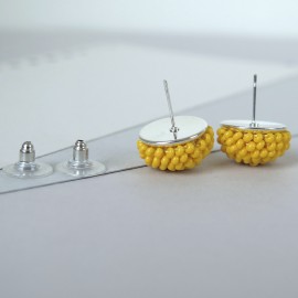 GERVUOGĖLĖS. Geltoni apvalūs auskarai 