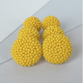 GERVUOGĖLĖS. Geltoni apvalūs auskarai 