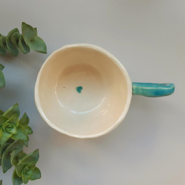 Arbatinis puodelis su taškeliais